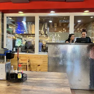 Dumpling making station (with large window to watch!) next to their kitchen