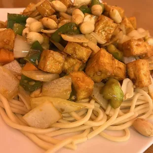 Kung R4. Kun Pao Tofu Over Noodles