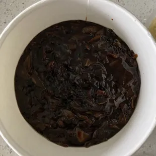 a bowl of brown sauce