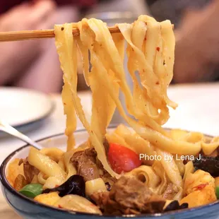 Savory Braised Chicken Noodle 大盘鸡刀削面 ($14.80) - it&apos;s just OK. Chicken is dry and the sauce isn&apos;t very flavorful.
