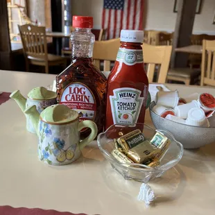 Plenty of log cabin syrup and ketchup.