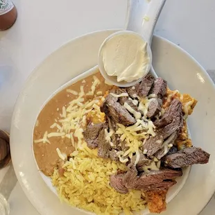 Ernestos Chilaquiles added Steak