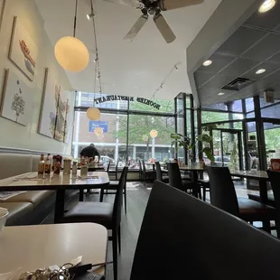 a restaurant with a ceiling fan