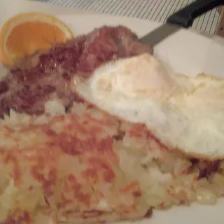 Two Eggs With Hash Browns and Toast