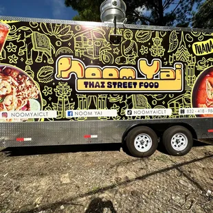 a food truck parked in a parking lot