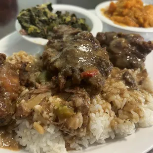 Oxtails with greens and yams.