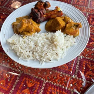 a plate of chicken and rice