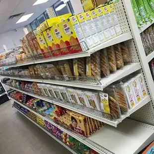 Foodstuffs are well-arranged on the shelves.