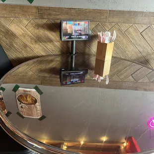 You can use the pads to order from your table.