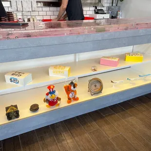  a counter with various items on it