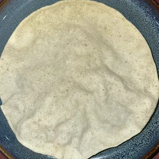 a flat bread on a plate