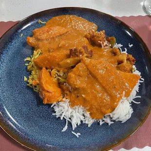 Buffet of rice, fried rice, and butter chicken