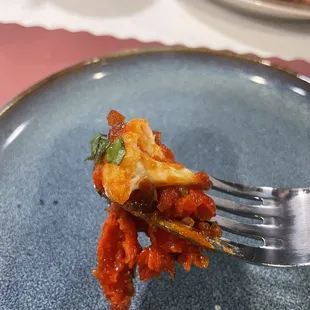 a piece of food on a fork