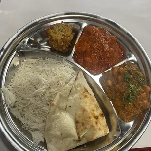 Lunch special with: Chicken Tikka masala Chana Masala Some appetizer I don't remember the name of Slice of naan bread Rice All for $10!