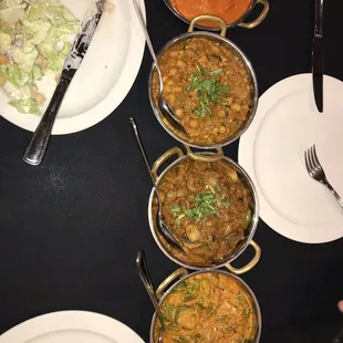 a variety of dishes of food