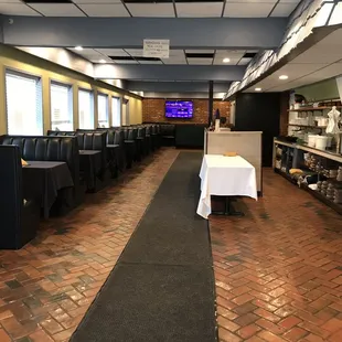 a long table with a white tablecloth on it