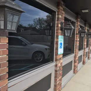 the reflection of a car in the window