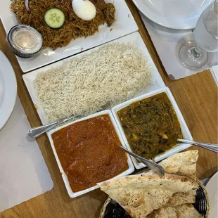 garlic naan, chicken tikka masala, saag paneer, basmati rice, lamb biryani
