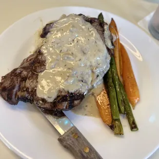 Ribeye, mashed potatoes, asparagus and carrots.
