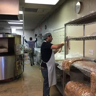 Starting to stretch the dough.