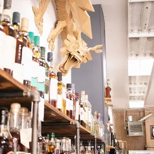 Dragon trying to have some of the liquor!