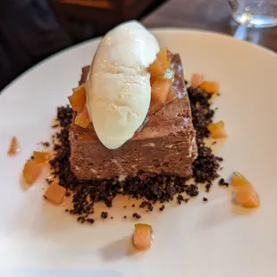 CHOCOLATE MARQUISE, HAZELNUT CRUMBLE, PLUOT AND KAFFIR LIME CHANTILLY - $16