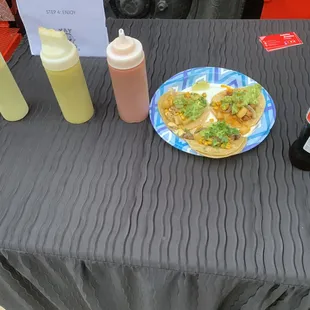 a plate of food and condiments