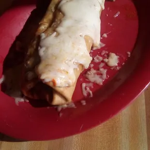 Nopalitos' green Chile chimichanga. Too much cheese and too little green Chile sauce. But it was good.