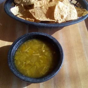 Nopalitos' chips and their famous warm green salsa.