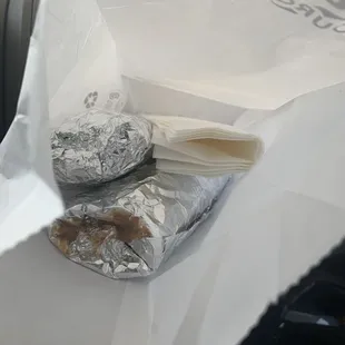 Messy tasteless burritos and not worth the price.