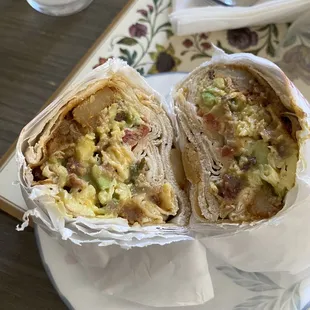 Bacon, egg, cheese burrito with avocado. Around $15 November 2023