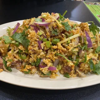 24. Yum Naem Khao Thot