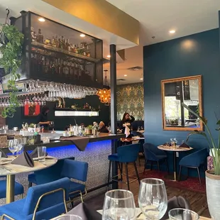 blue chairs and a bar