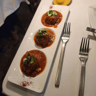 Spicy Chicken Meatballs. Super tender and flavorful. Wonderful with hummus. Was room temperature. Wished it was warm.