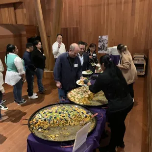 Paella buffet for nonprofit anniversary event at Curiodyssey!