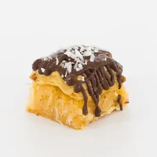 A close up of our Dark Chocolate Coconut Almond Baklava