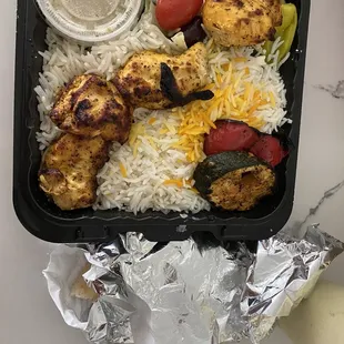 Chicken kabob with 4 pieces of chicken for $14. Mostly rice.