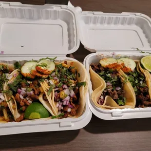 two tacos in a styrofoam container