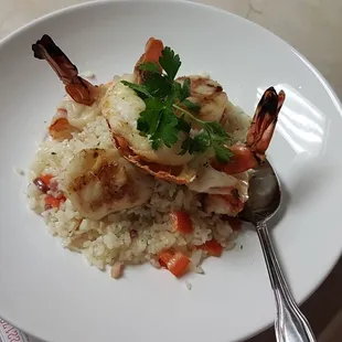 Seafood over risotto Rice