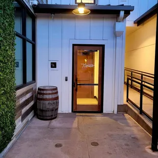 The entrance is on the side of the building