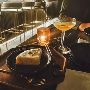 I ordered a cocktail and merengue cheesecake.