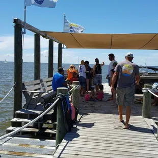 on our way to the delivery boat that takes us out to the parasailing speed boat..