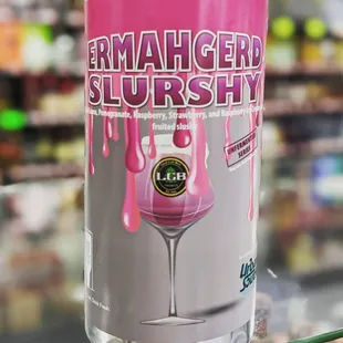 a glass of pink liquid