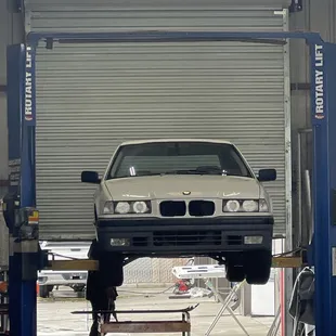 My car on their lift while they work