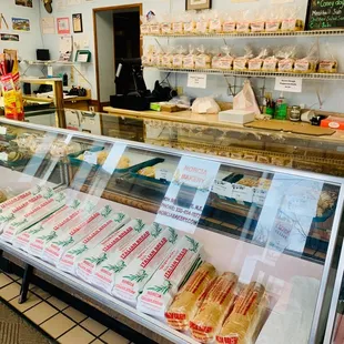a display of sandwiches and pastries