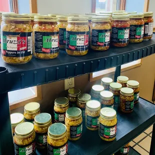 jars of pickled vegetables on a shelf