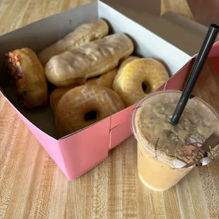 Half dozen donuts and Vietnamese iced coffee