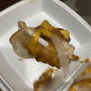 a fork with a bite taken out of it