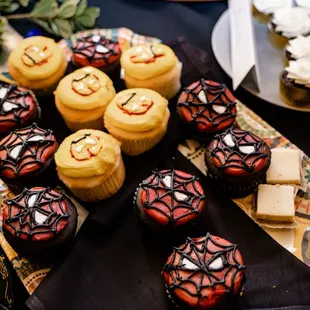 a variety of halloween cupcakes