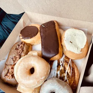 Maple bacon, Boston cream, butter cream, blueberry cake, apple danish, chocolate long John, glazed pastry